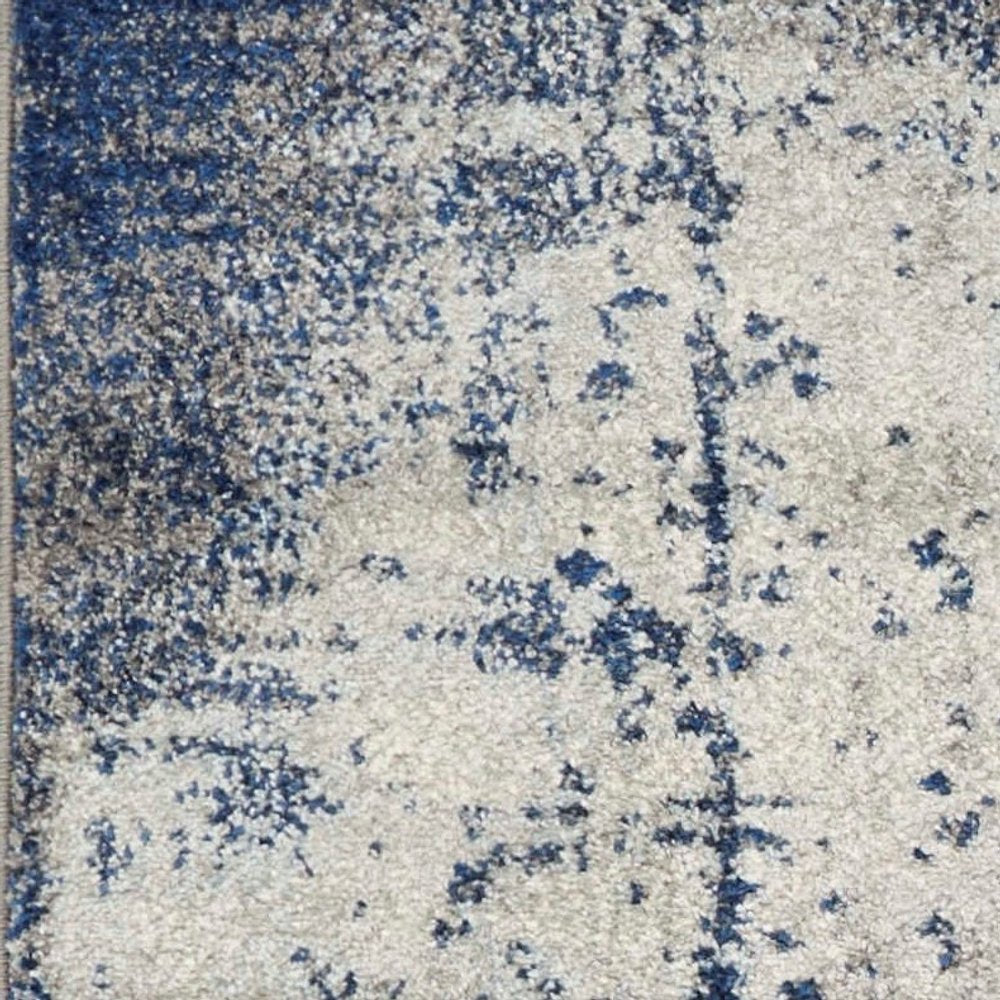 5' X 7' Blue Ivory And Gray Abstract Area Rug