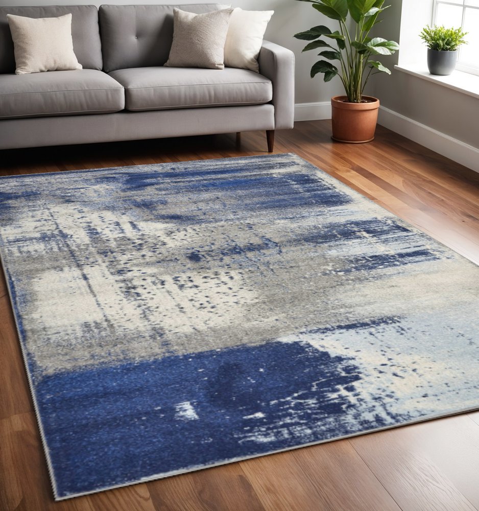 5' X 7' Blue Ivory And Gray Abstract Area Rug