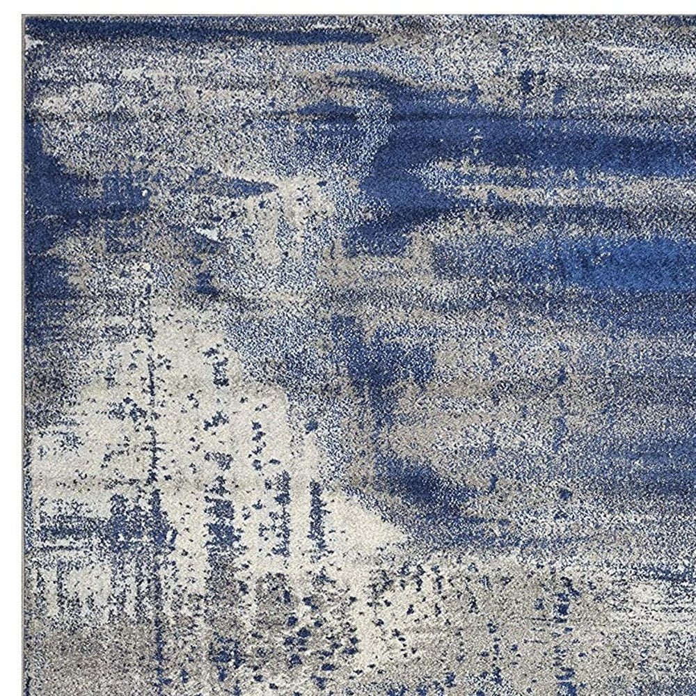 5' X 7' Blue Ivory And Gray Abstract Area Rug