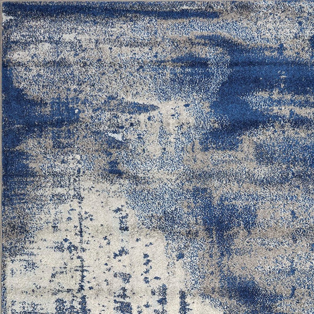 5' X 7' Blue Ivory And Gray Abstract Area Rug