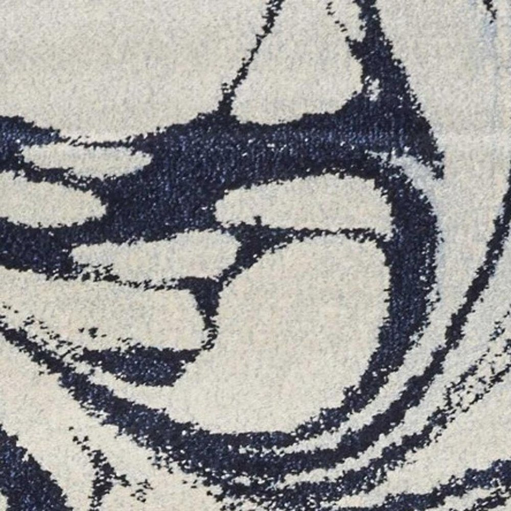 3' X 5' Blue And Ivory Abstract Area Rug