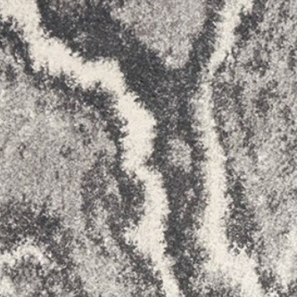 5' X 8' Gray And Ivory Abstract Area Rug