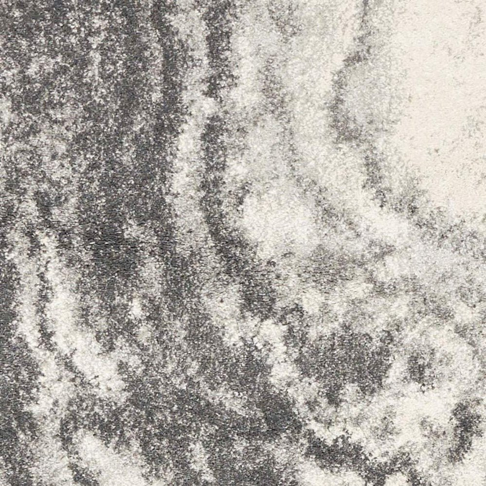 5' X 8' Gray And Ivory Abstract Area Rug