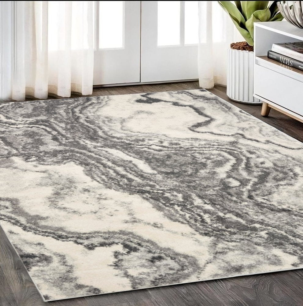 5' X 8' Gray And Ivory Abstract Area Rug