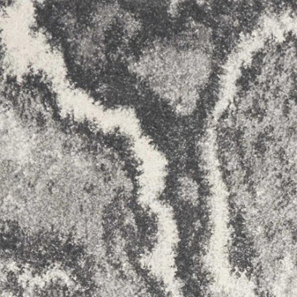 5' X 8' Gray And Ivory Abstract Area Rug