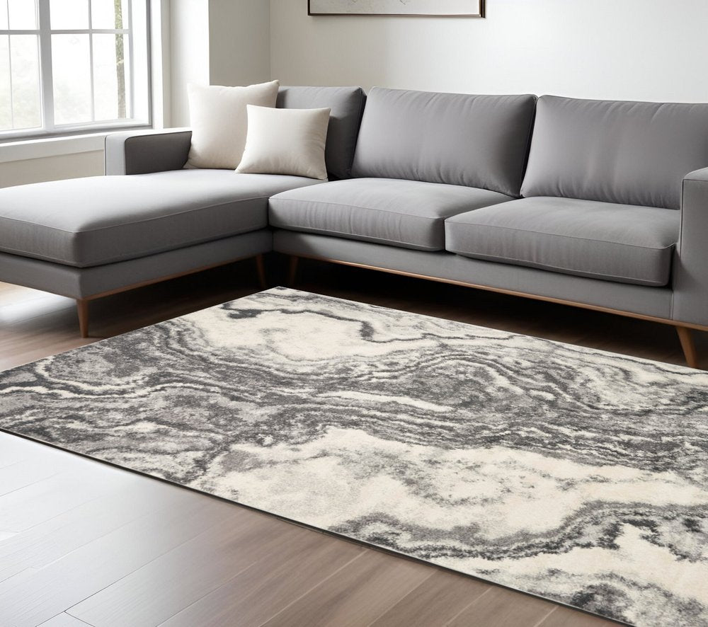 5' X 8' Gray And Ivory Abstract Area Rug