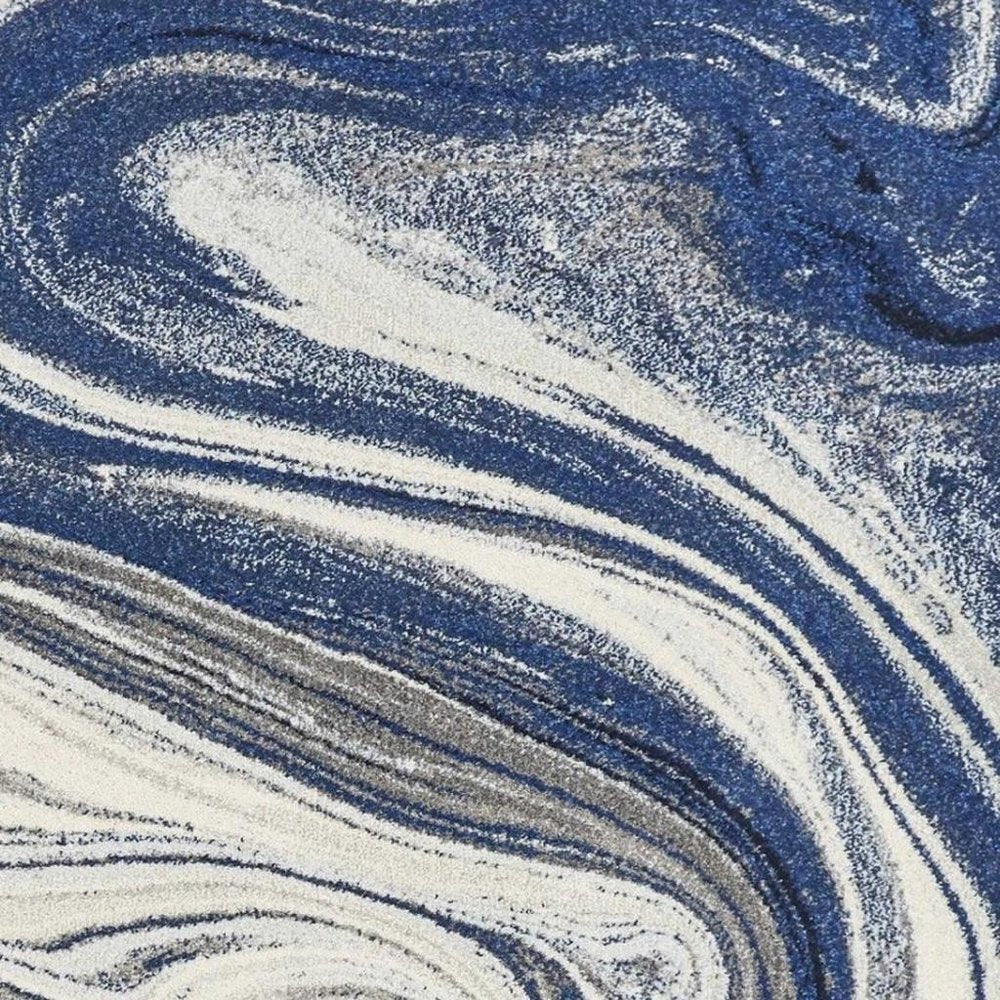 5' X 7' Blue And Beige Abstract Area Rug