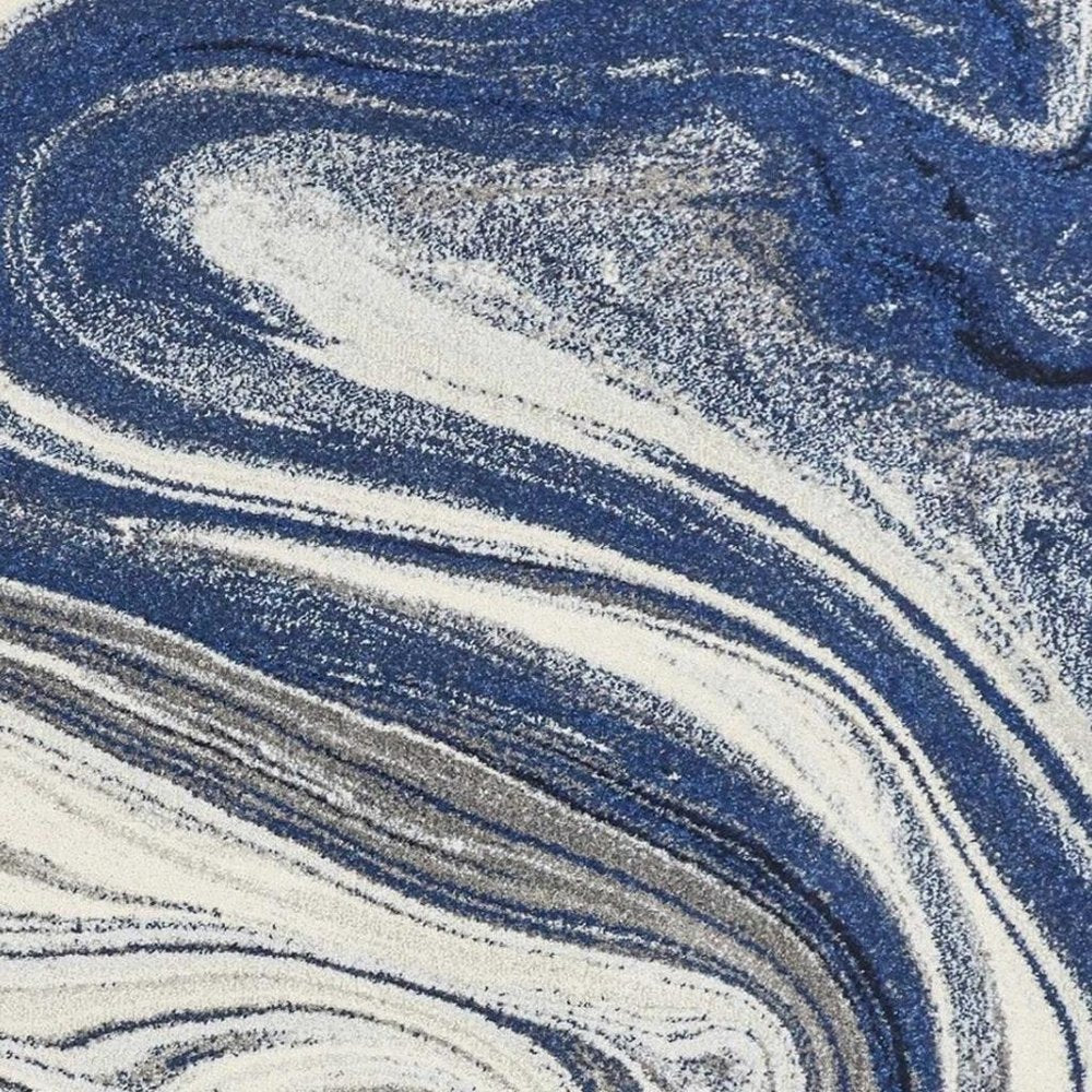 5' X 7' Blue And Beige Abstract Area Rug