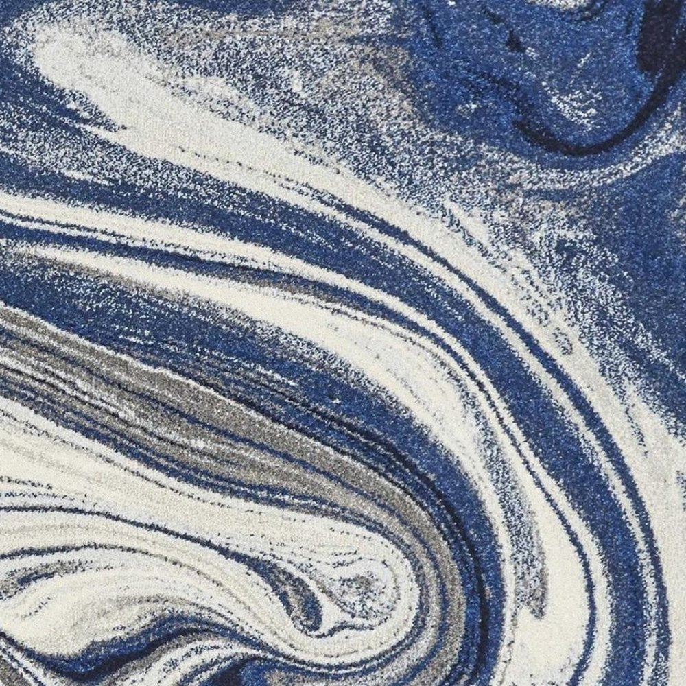 5' X 7' Blue And Beige Abstract Area Rug