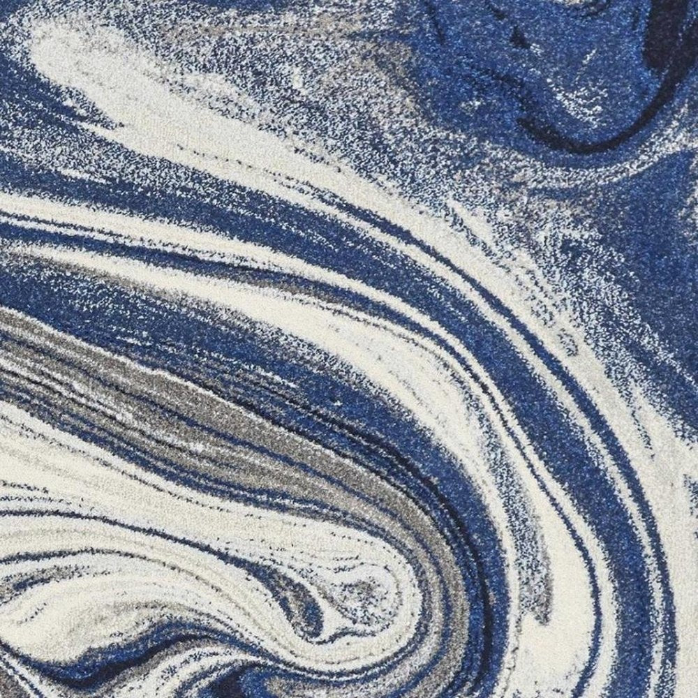 5' X 7' Blue And Beige Abstract Area Rug