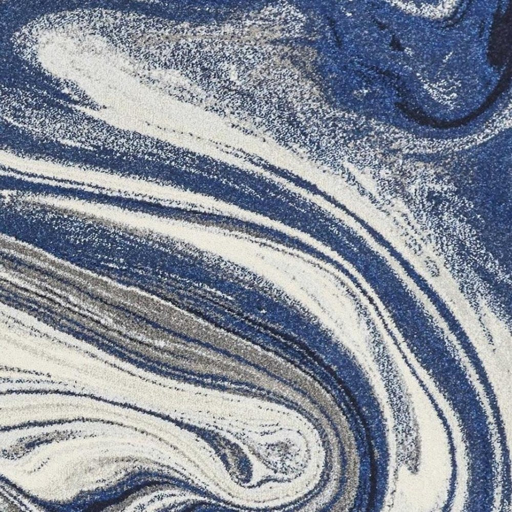 5' X 7' Blue And Beige Abstract Area Rug