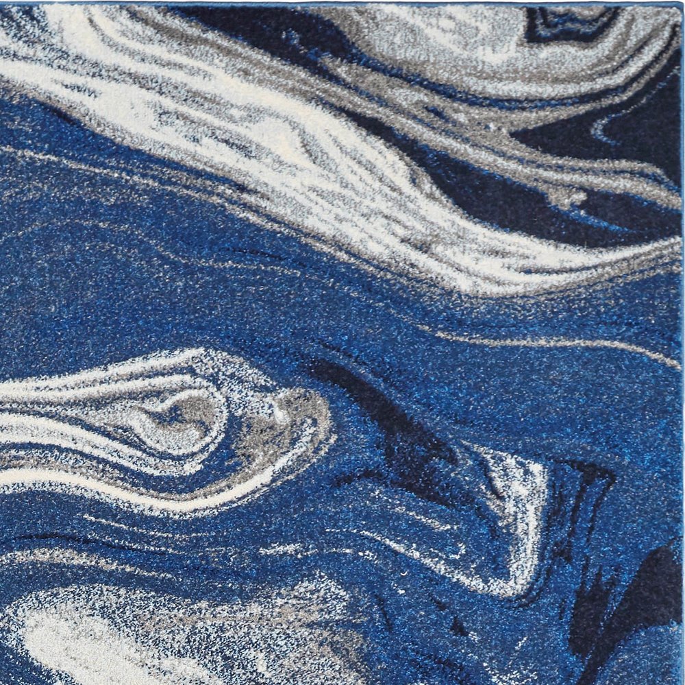 5' X 7' Blue And Beige Abstract Area Rug