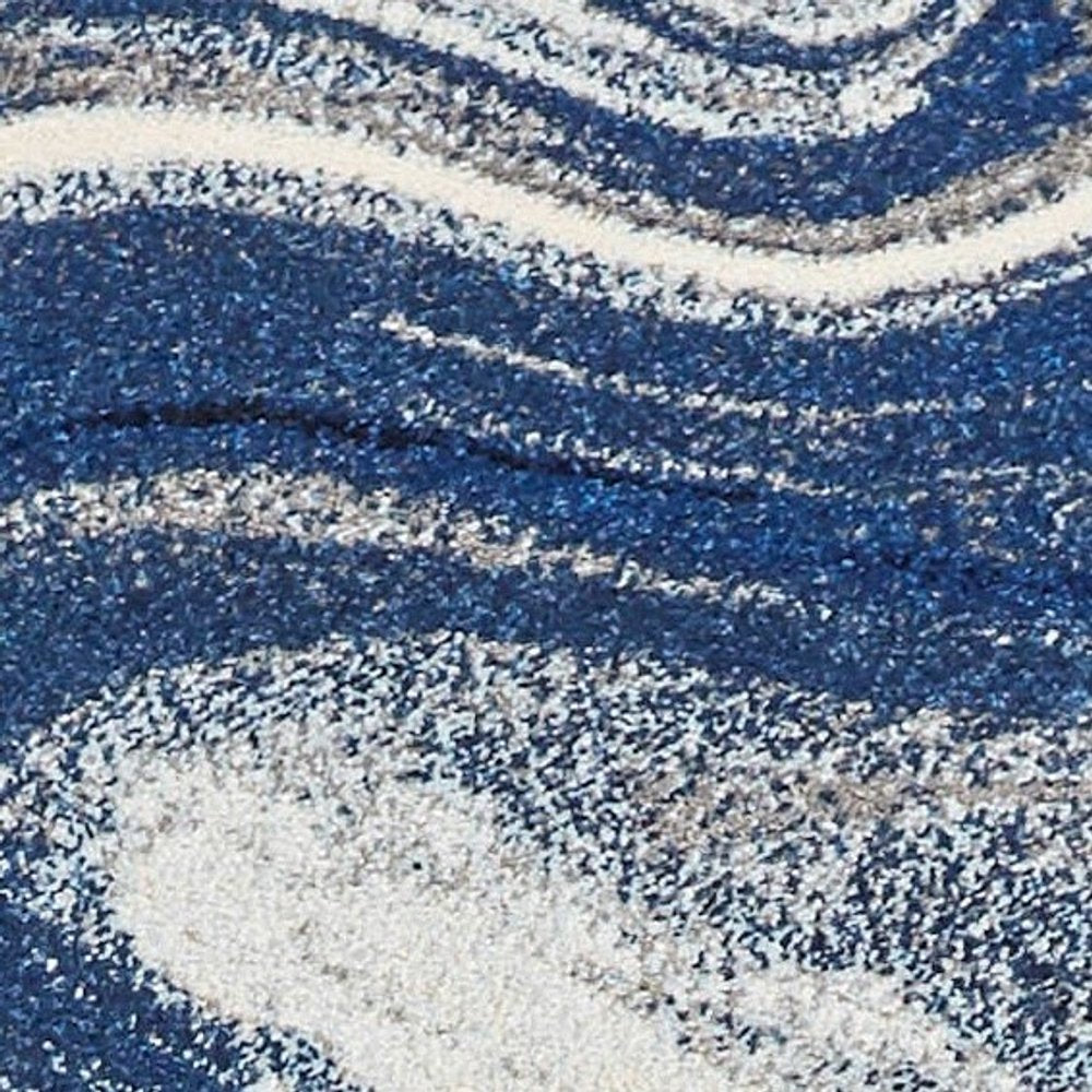 5' X 7' Blue And Beige Abstract Area Rug
