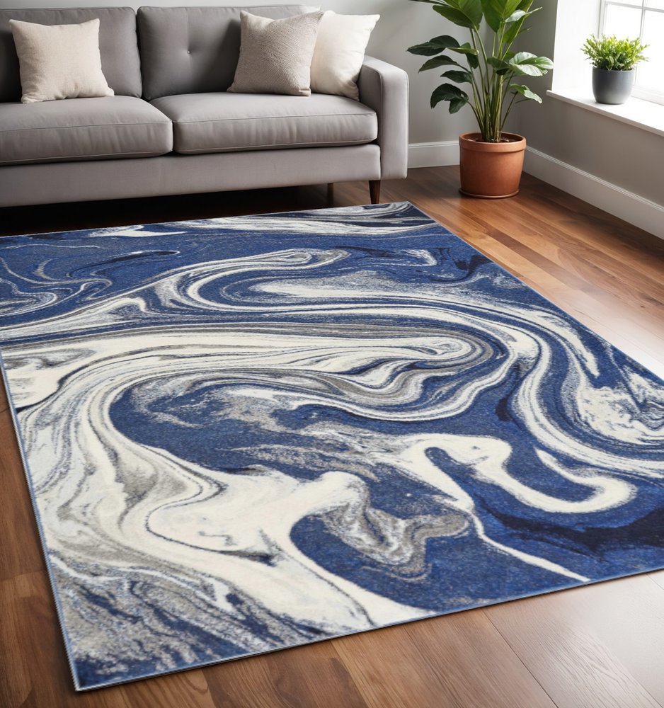 5' X 7' Blue And Beige Abstract Area Rug