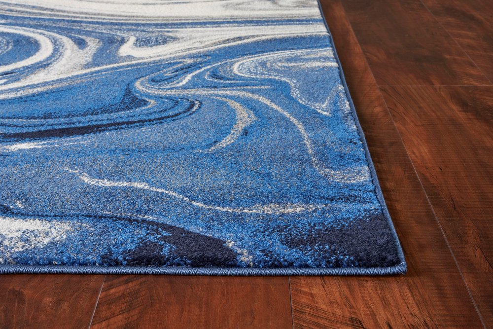 5' X 7' Blue And Beige Abstract Area Rug