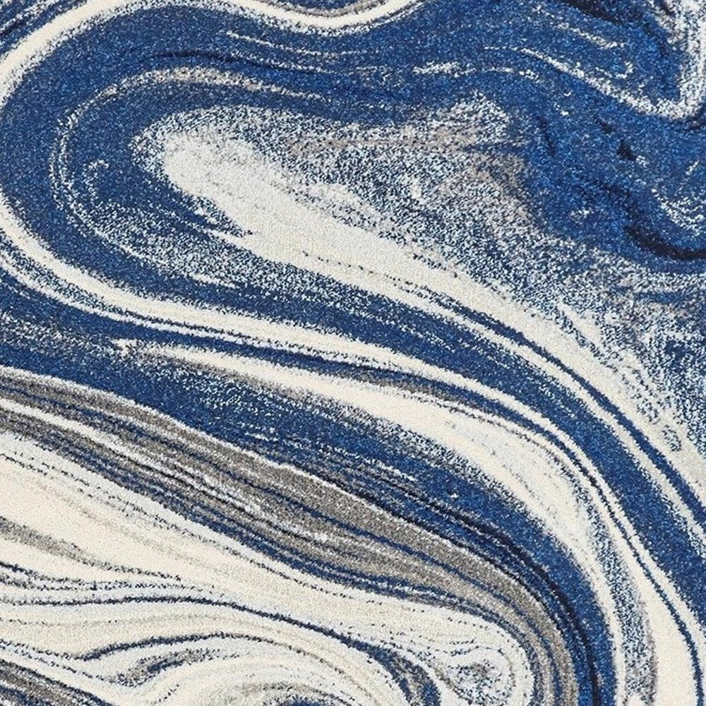 5' X 7' Blue And Beige Abstract Area Rug