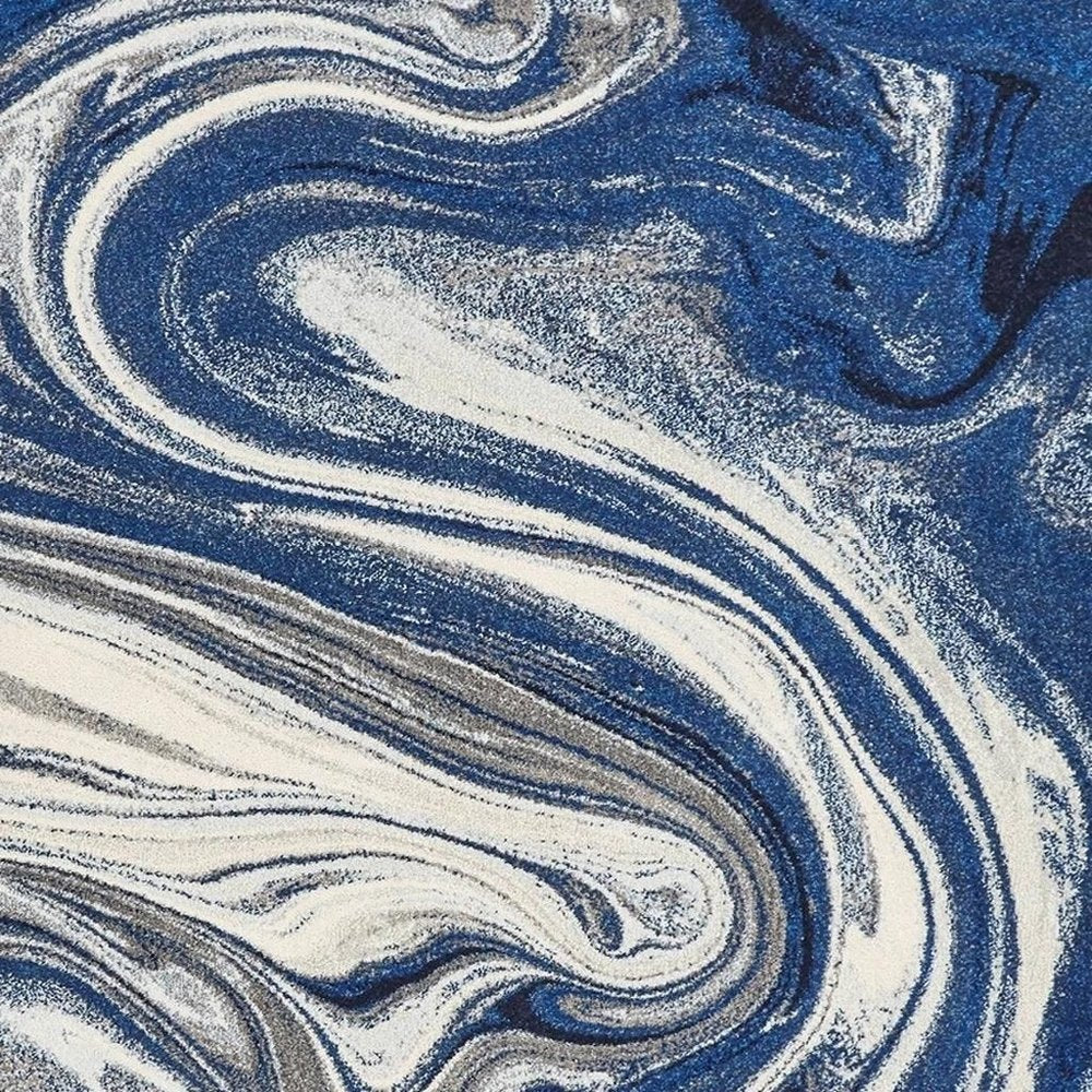 5' X 7' Blue And Beige Abstract Area Rug