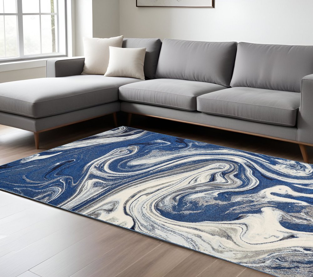 5' X 7' Blue And Beige Abstract Area Rug