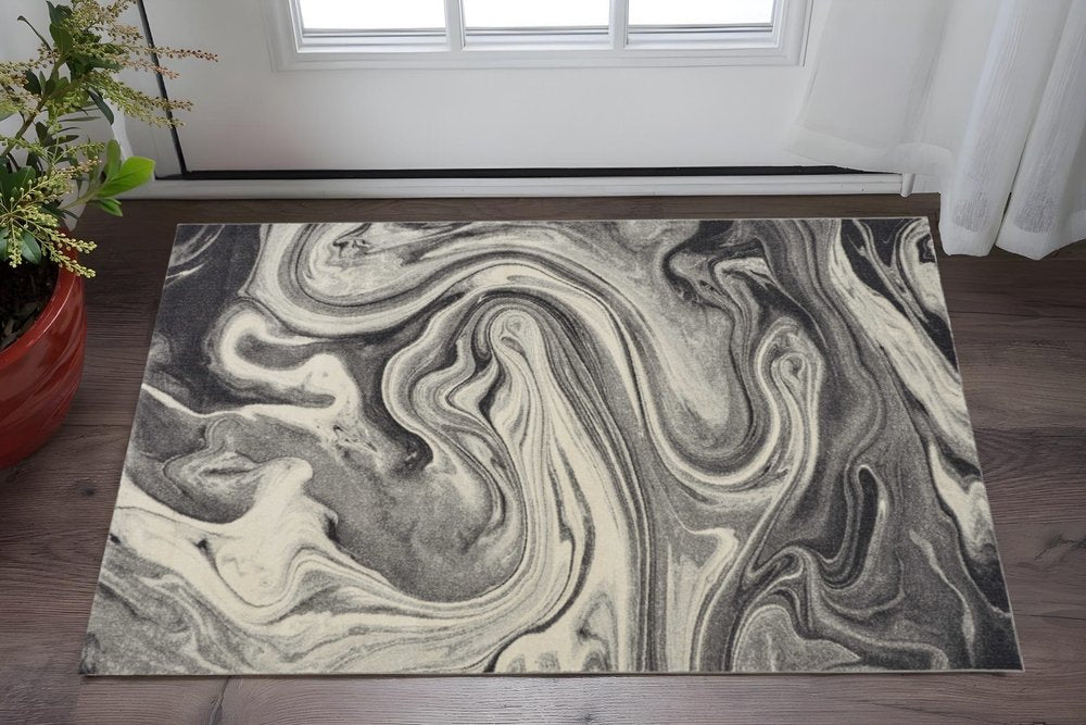 5' X 8' Ivory Black And Gray Abstract Area Rug