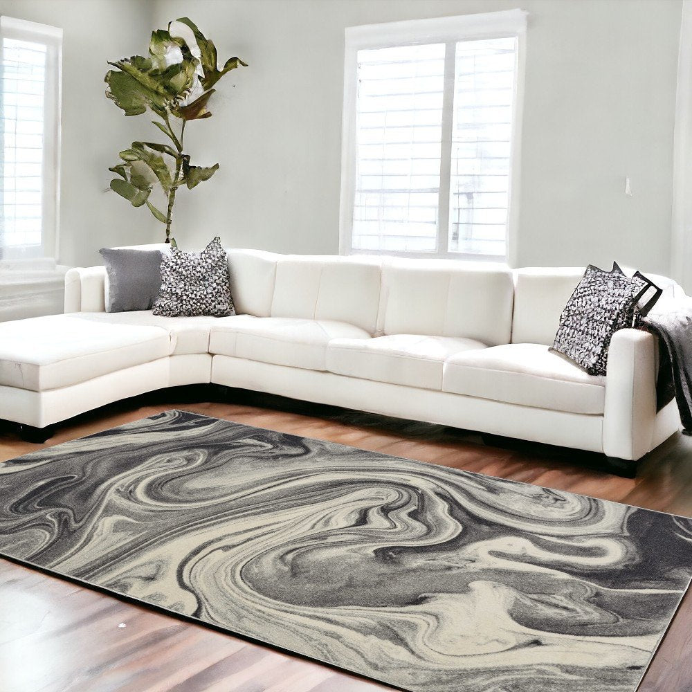 5' X 8' Ivory Black And Gray Abstract Area Rug