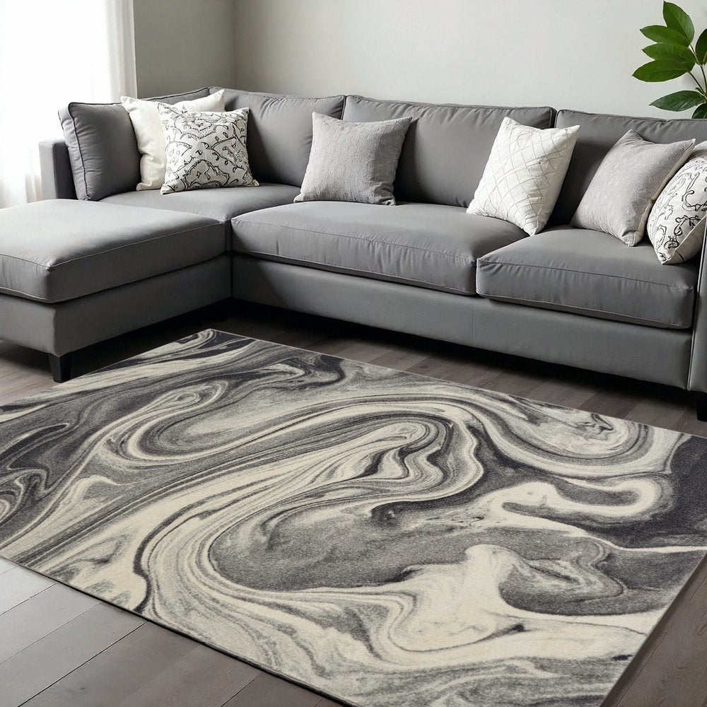 5' X 8' Ivory Black And Gray Abstract Area Rug
