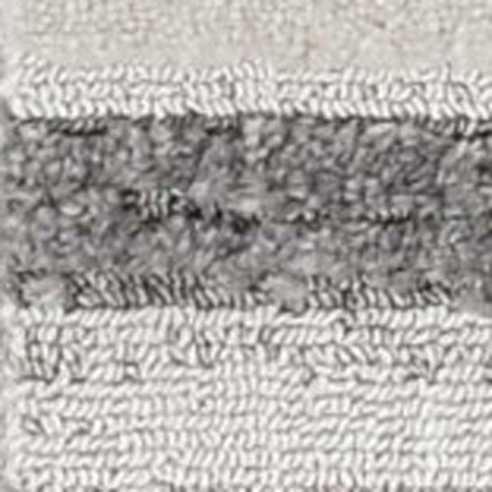 5' X 8' Gray and Ivory Abstract Area Rug