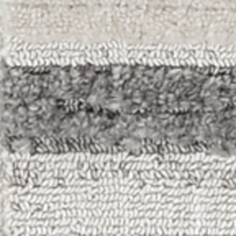 5' X 8' Gray and Ivory Abstract Area Rug