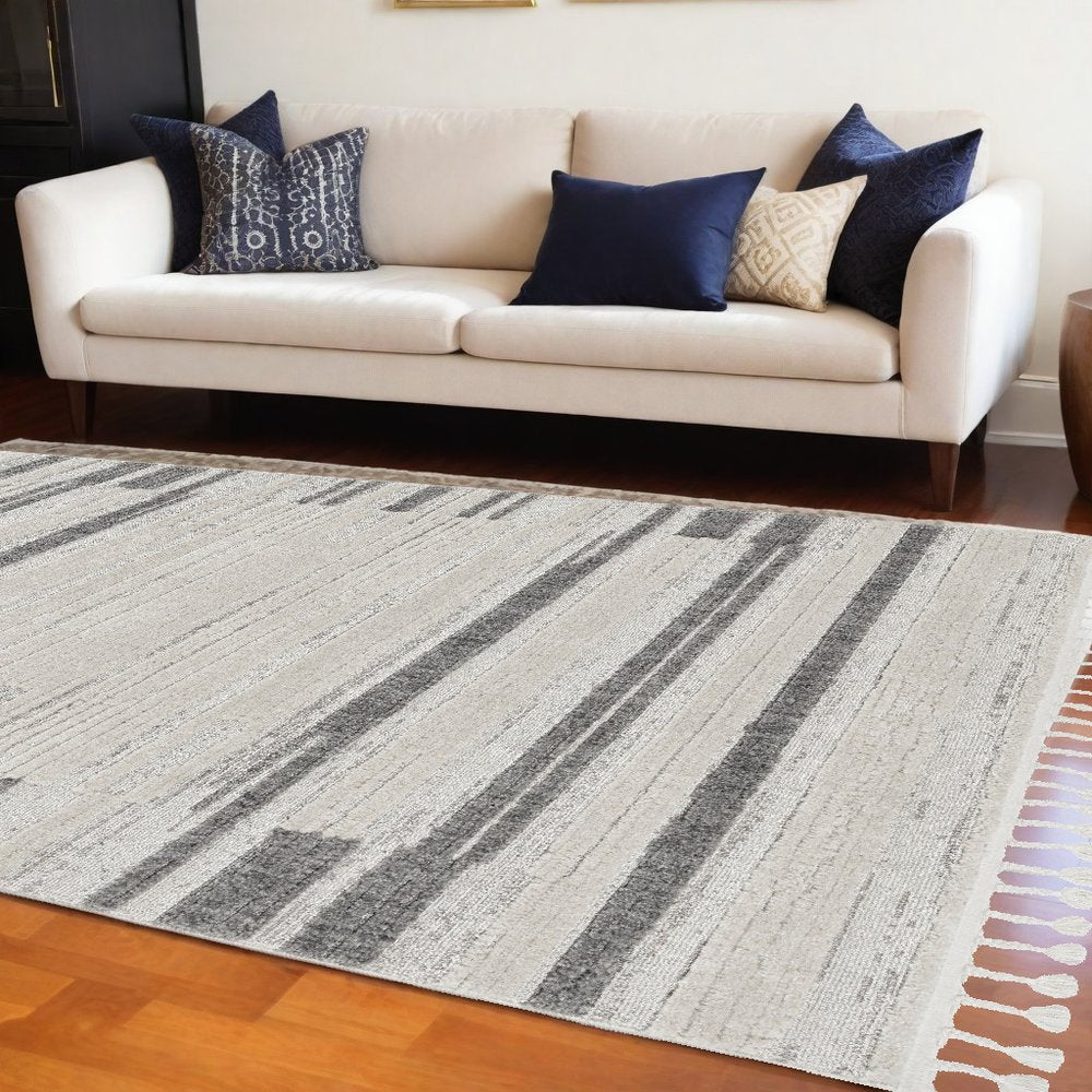 5' X 8' Gray and Ivory Abstract Area Rug