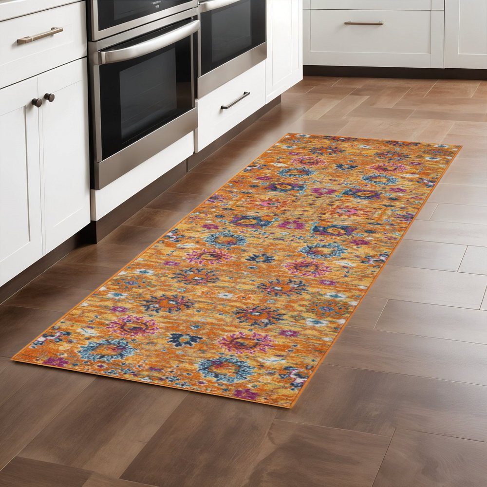 7' X 10' Blue And Orange Floral Distressed Area Rug