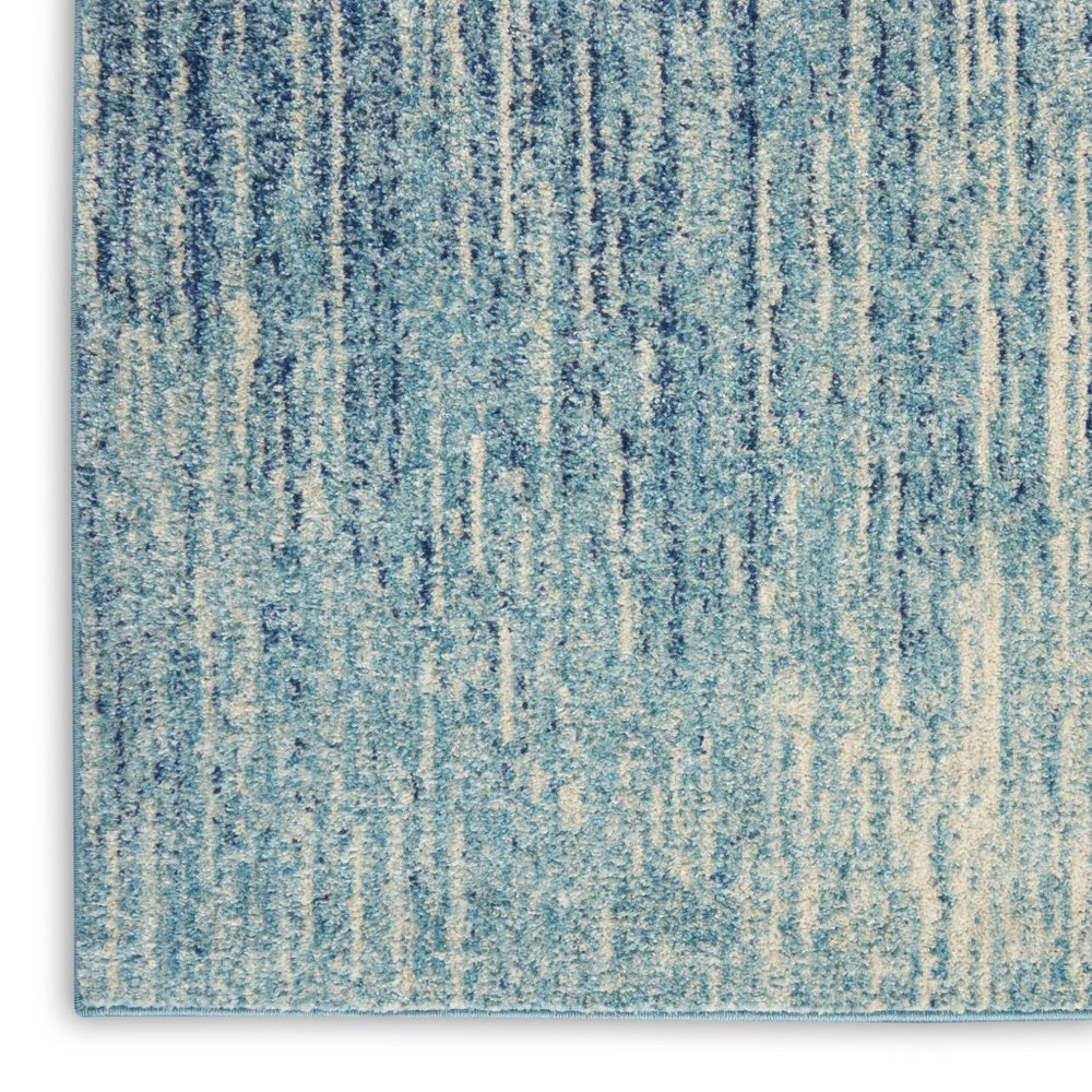 5' X 7' Blue And Ivory Abstract Area Rug