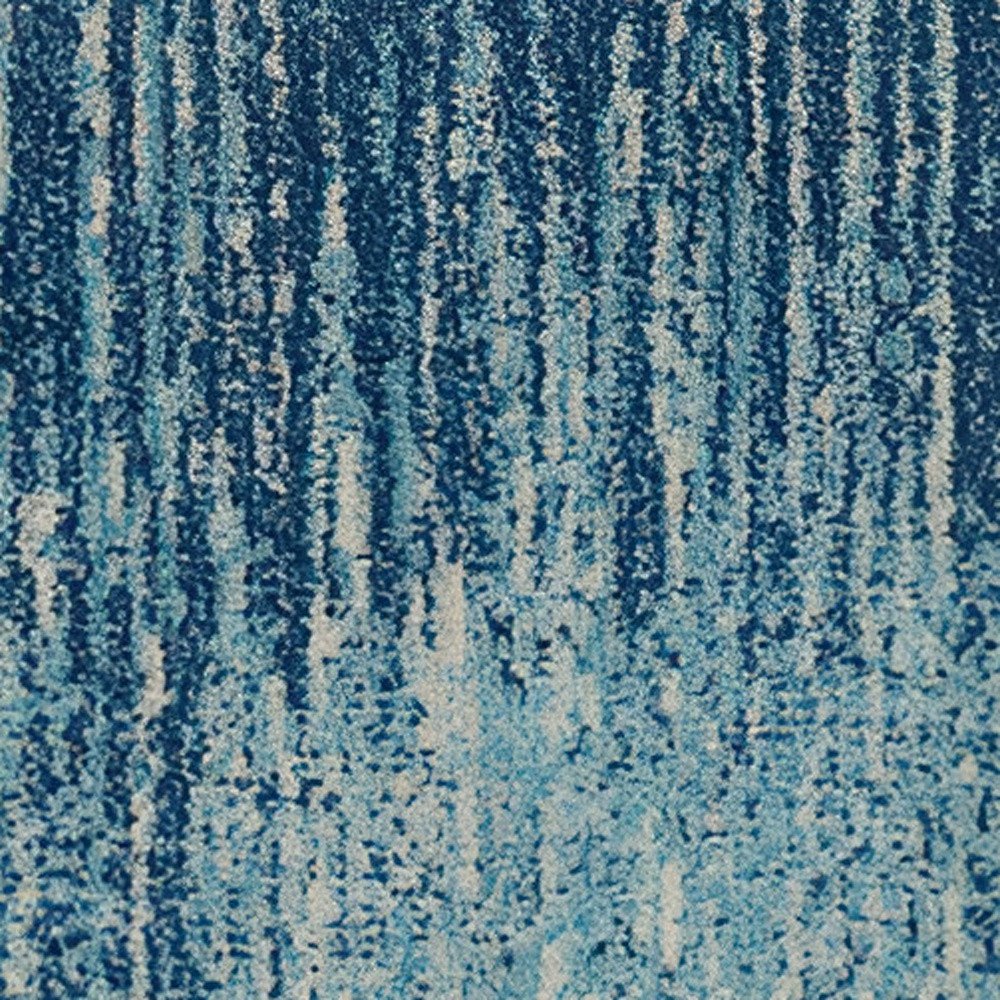 5' X 7' Blue And Ivory Abstract Area Rug