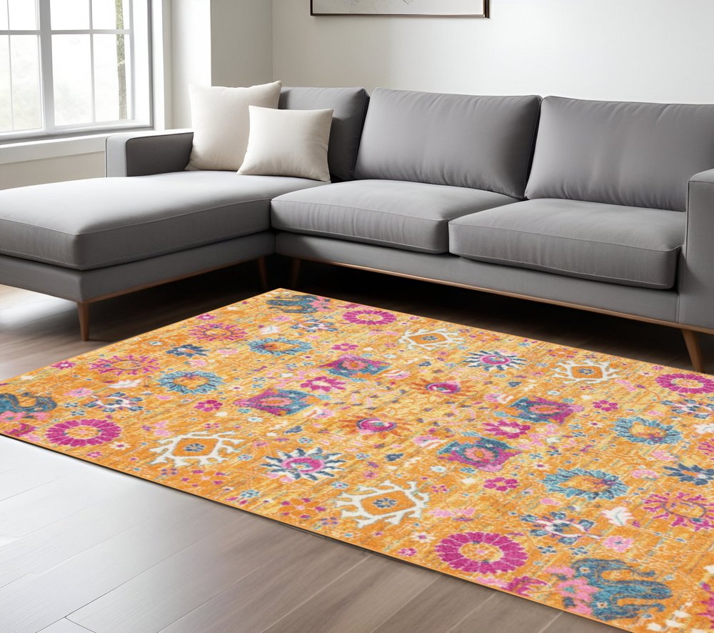 7' X 10' Blue And Orange Floral Distressed Area Rug