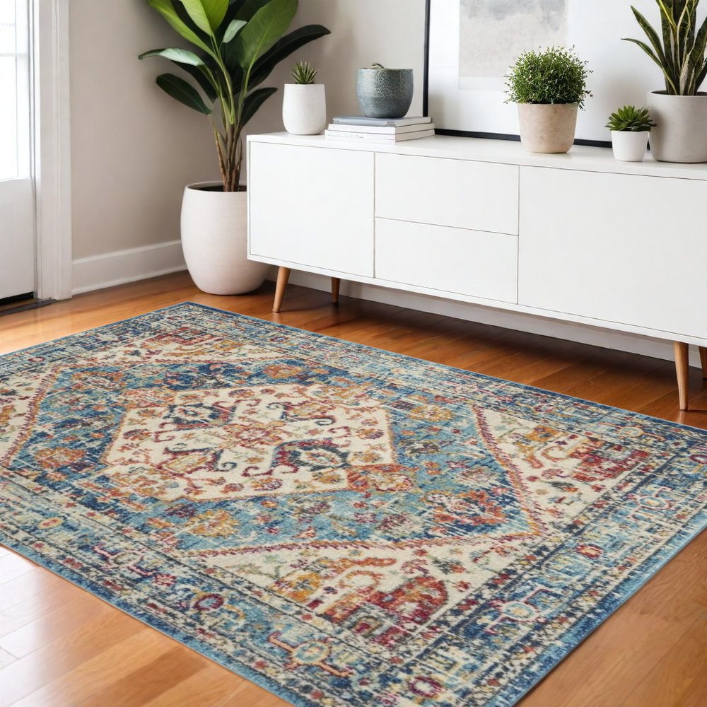 7' X 10' Ivory And Blue Oriental Distressed Area Rug