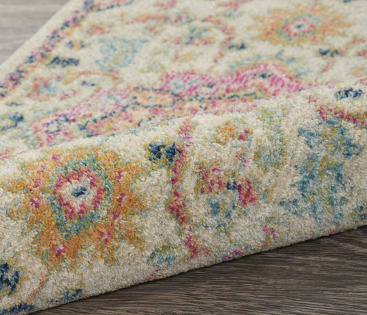 5' X 7' Pink And Ivory Southwestern Distressed Area Rug