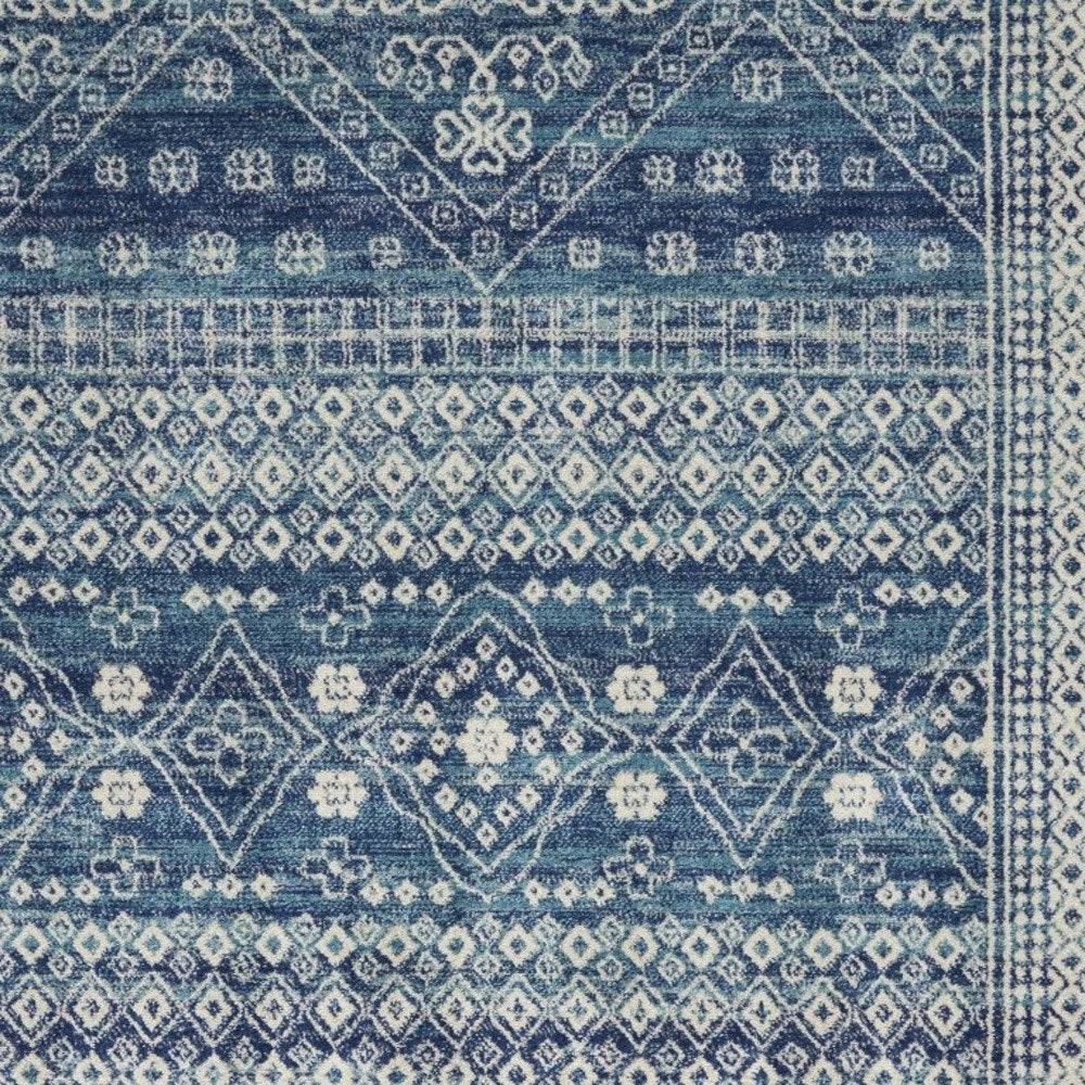 8' X 10' Navy Blue And Ivory Tribal Area Rug