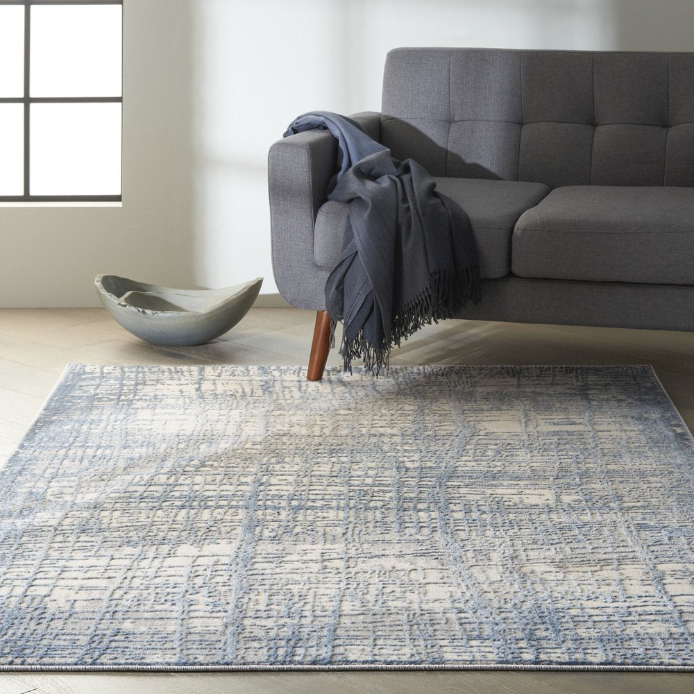 5' X 7' Gray And Ivory Abstract Distressed Area Rug