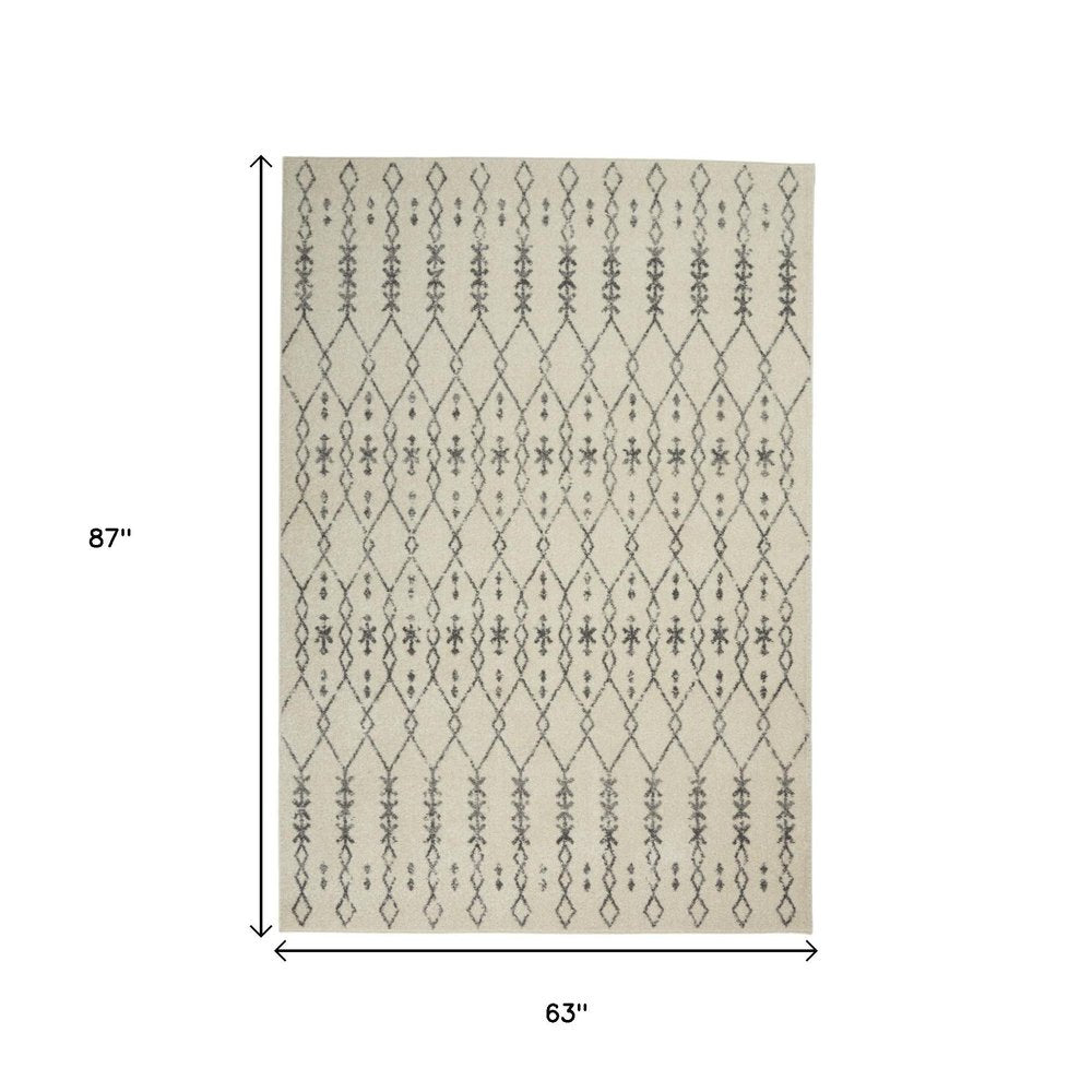 5' X 7' Gray And Ivory Geometric Distressed Area Rug