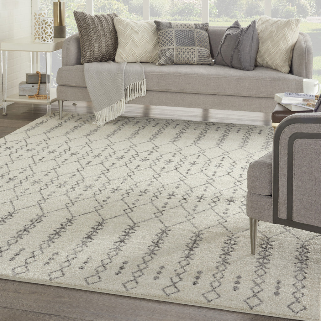 5' X 7' Gray And Ivory Geometric Distressed Area Rug