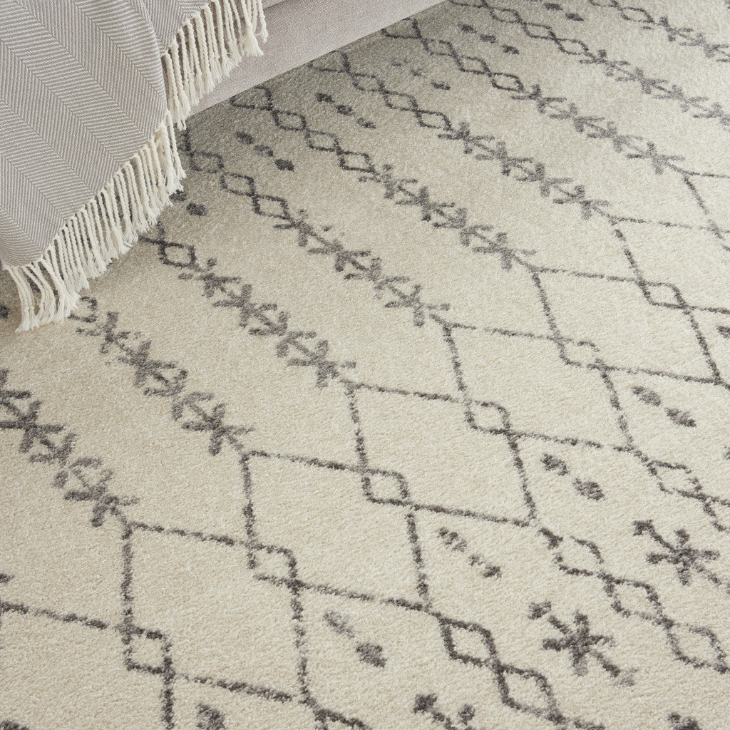 5' X 7' Gray And Ivory Geometric Distressed Area Rug