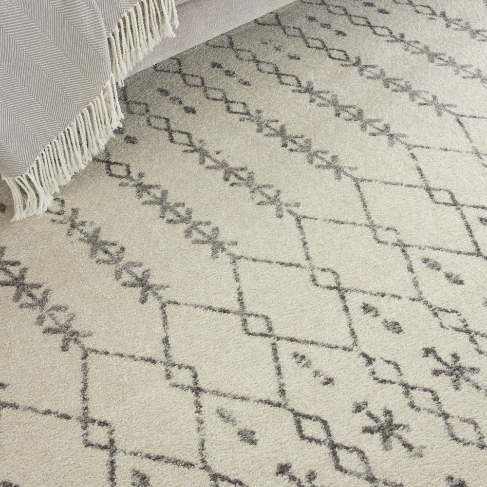 5' X 7' Gray And Ivory Geometric Distressed Area Rug
