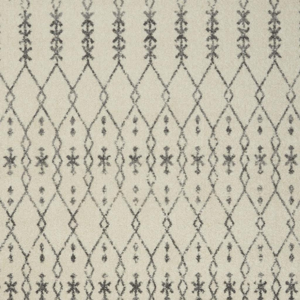 5' X 7' Gray And Ivory Geometric Distressed Area Rug