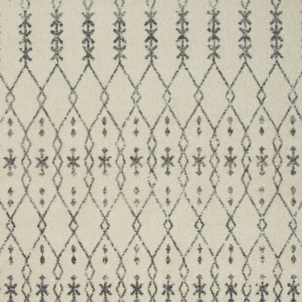 5' X 7' Gray And Ivory Geometric Distressed Area Rug