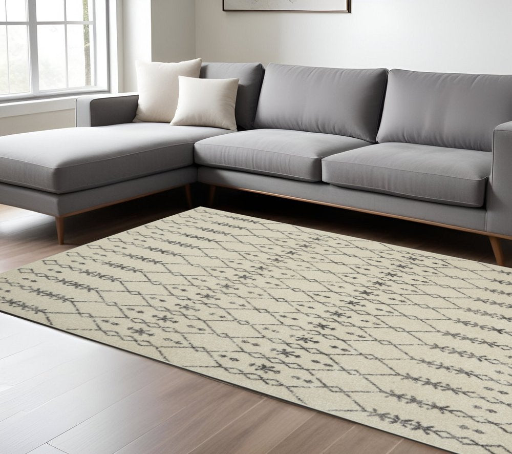 5' X 7' Gray And Ivory Geometric Distressed Area Rug