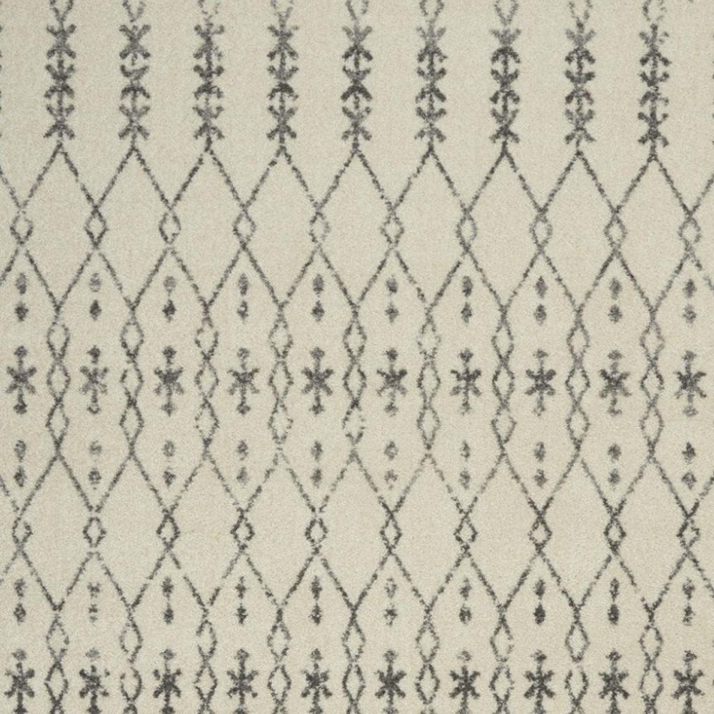 5' X 7' Gray And Ivory Geometric Distressed Area Rug