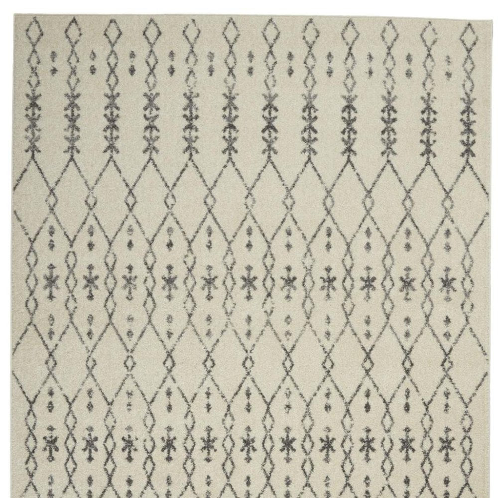 5' X 7' Gray And Ivory Geometric Distressed Area Rug