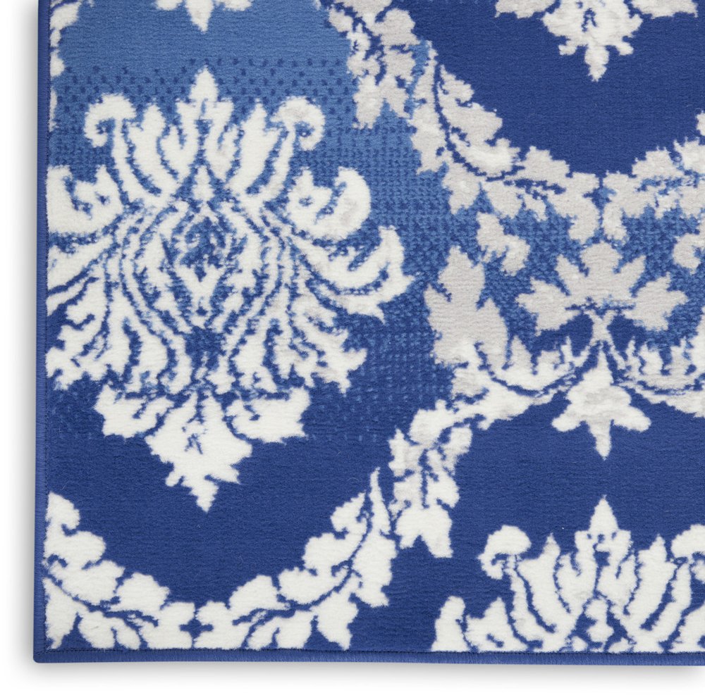 6' X 9' Blue And Ivory Damask Distressed Area Rug