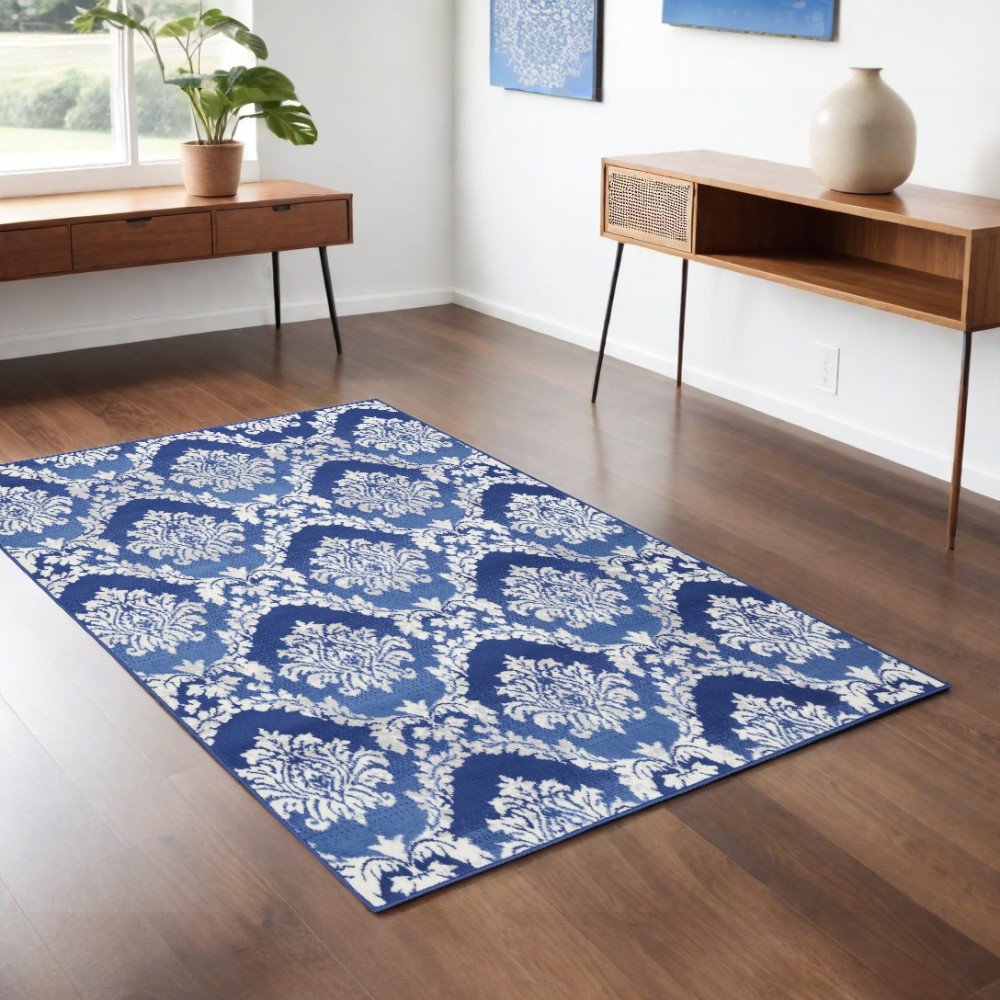 6' X 9' Blue And Ivory Damask Distressed Area Rug