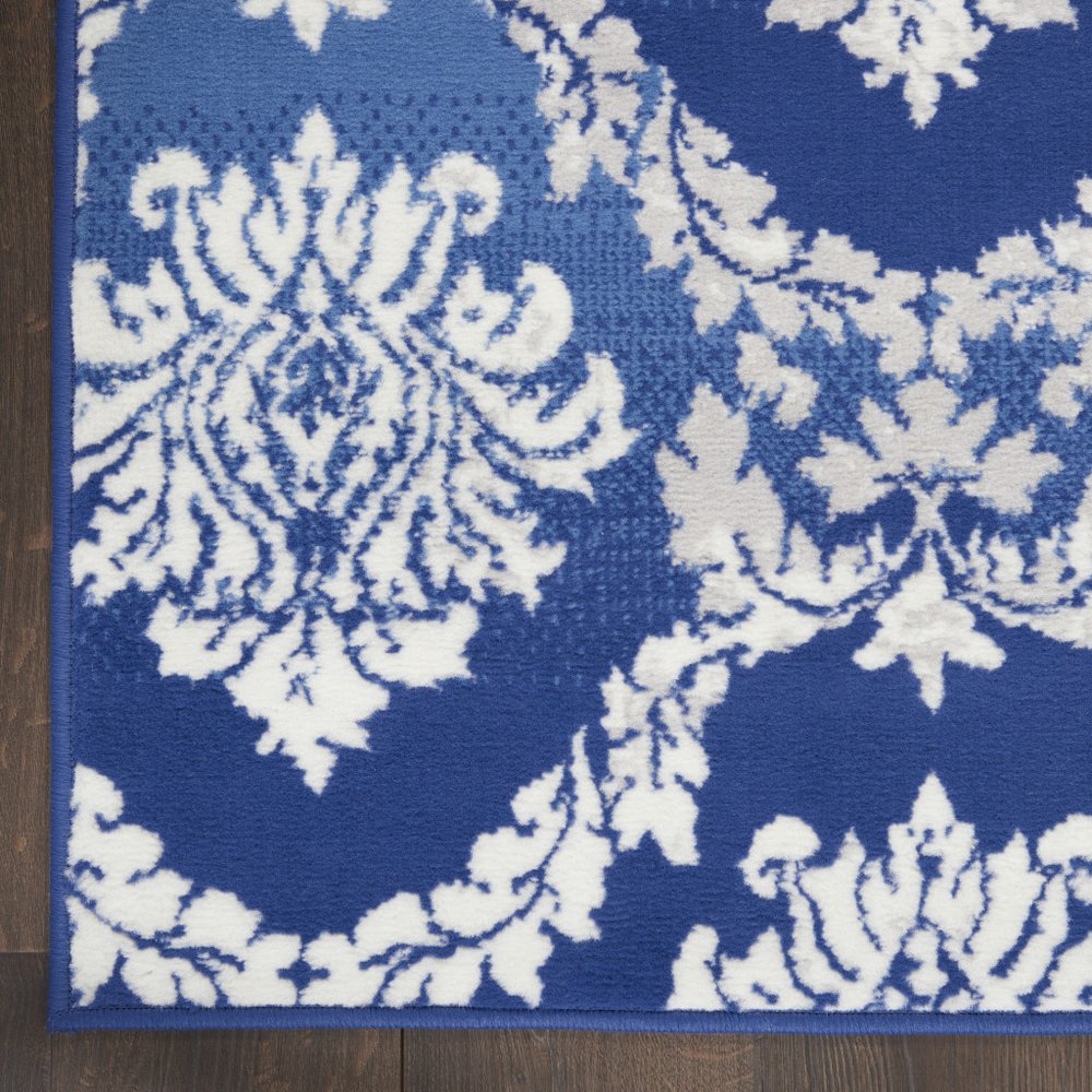 6' X 9' Blue And Ivory Damask Distressed Area Rug
