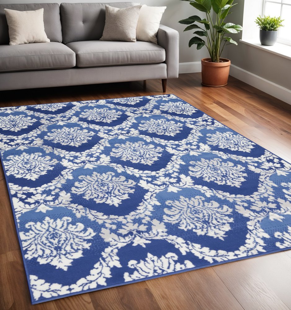 6' X 9' Blue And Ivory Damask Distressed Area Rug
