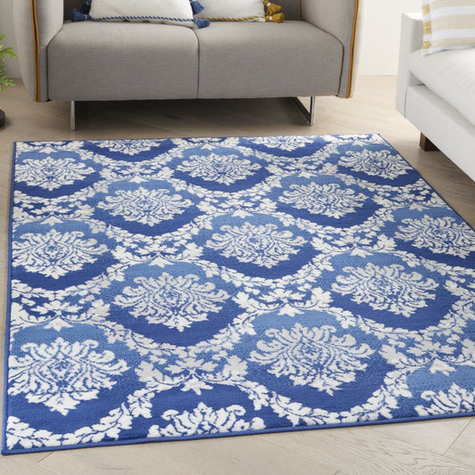 6' X 9' Blue And Ivory Damask Distressed Area Rug